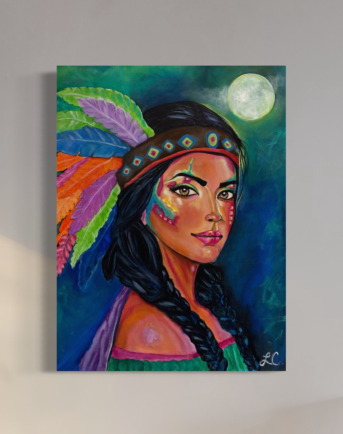 Colorful Print of a woman on canvas with colorful headdress and moon in the background