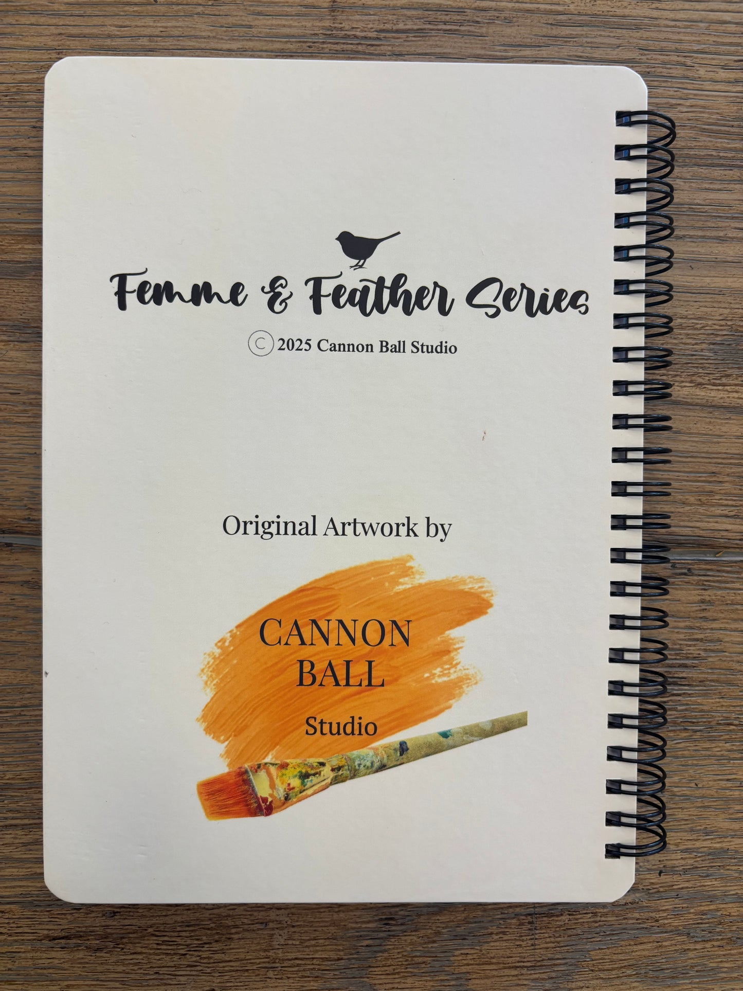 Back cover of a Femmes & Feathers art notebook featuring colorful feminine illustrated artwork and matching design elements from the collection.