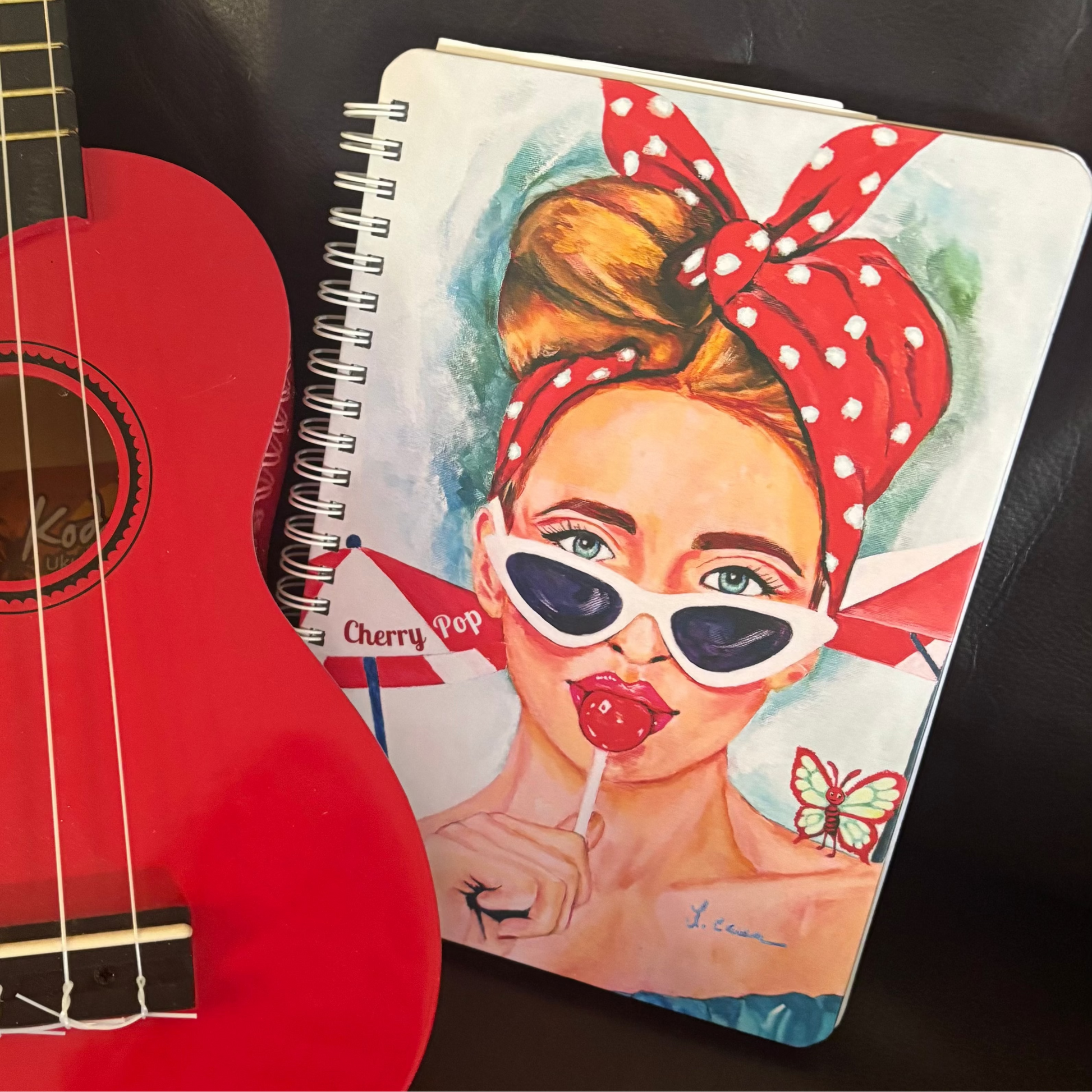 Cherry Pop colorful art notebook with illustrated female portrait cover