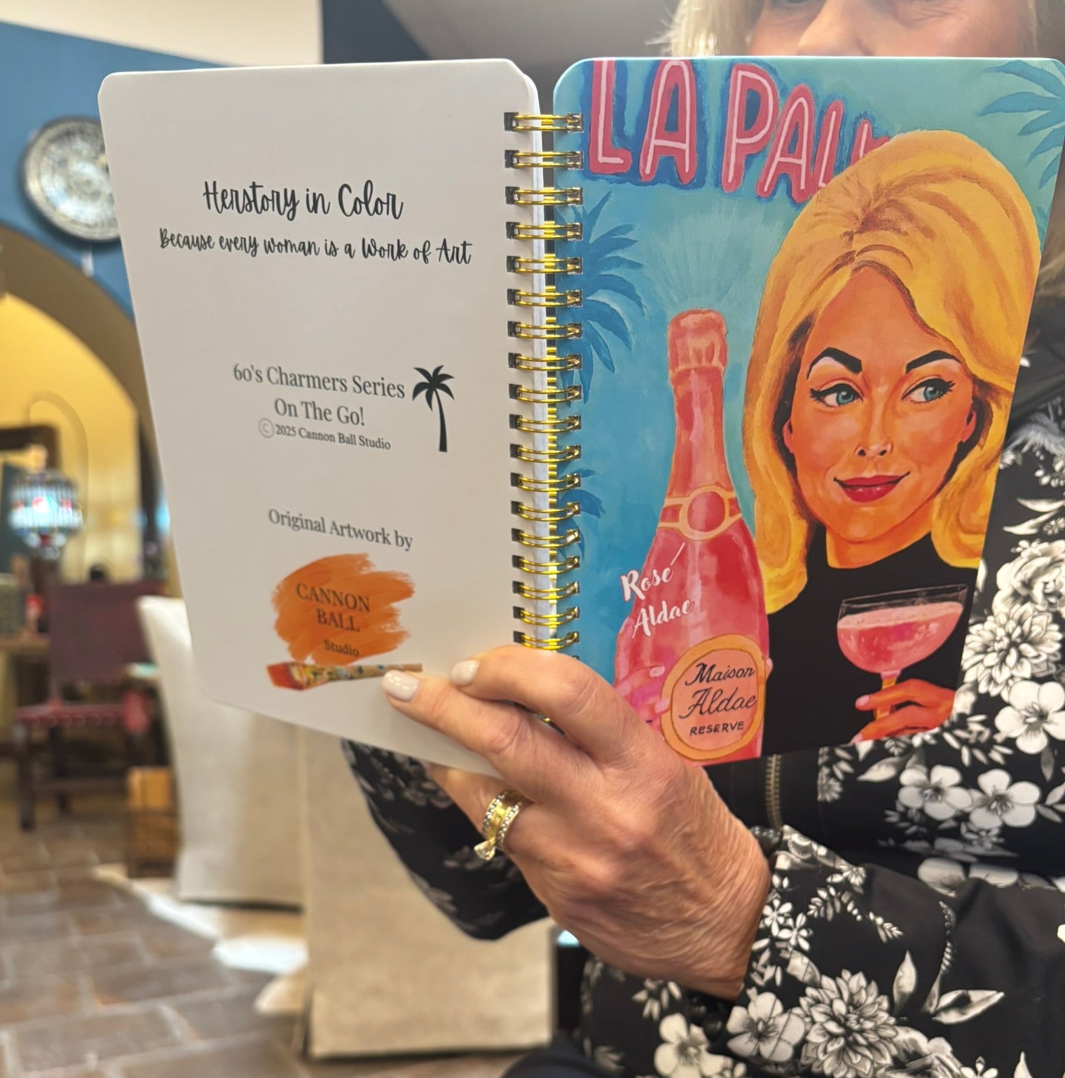 Back cover of the Rosé Aldae art notebook featuring colorful feminine artwork and bold retro-inspired design.