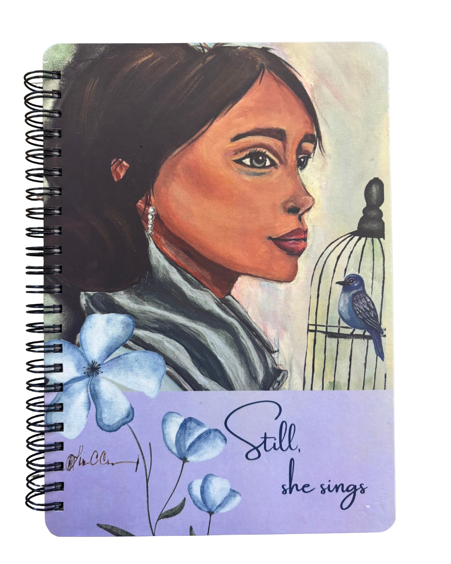 Still She Sings colorful art notebook with illustrated female portrait cover