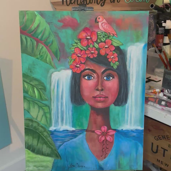 A painting showing original artwork and the notebook made from the painting of a colorful tropical women